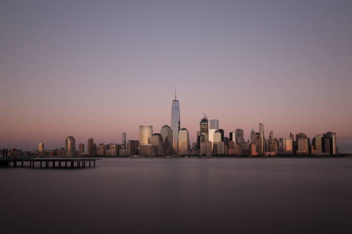 Zonsondergang op de New York City Skyline Zonsondergang op de New York City Skyline
