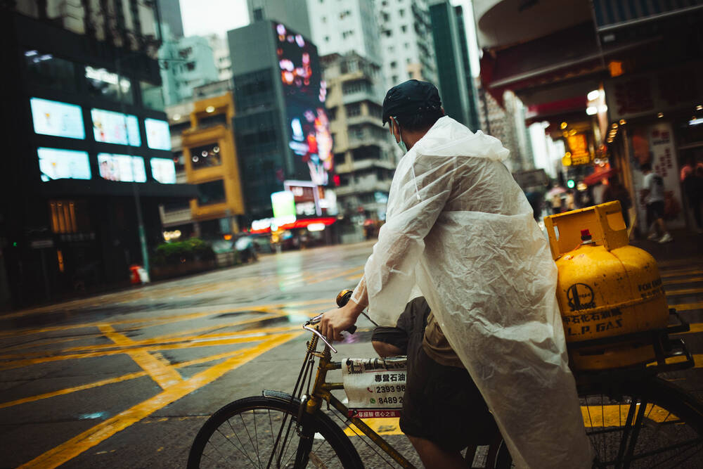 Cycling Through the Rain in Hong Kong