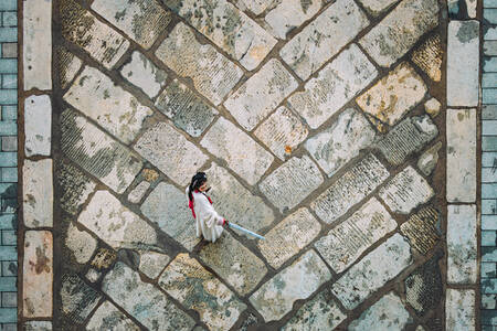 Aerial View of Woman in Traditional Dress on Xian City Wall