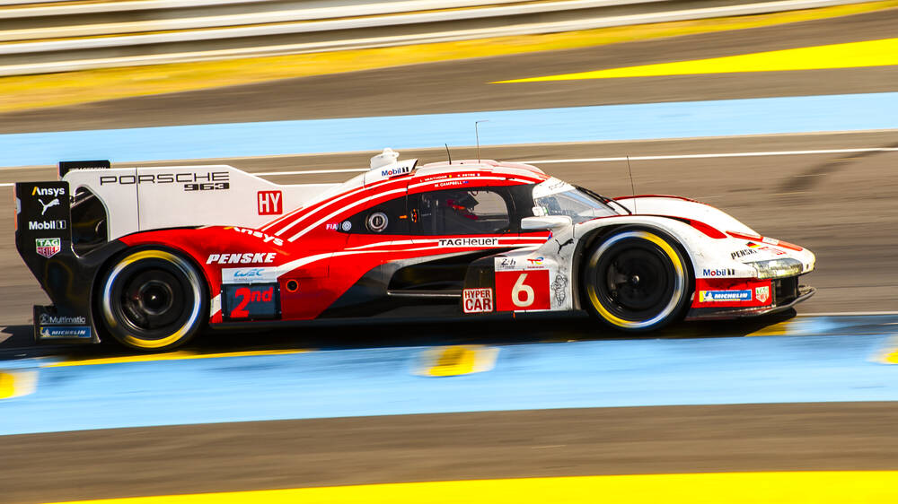 Kevin Estre at the top of the Porsche 963 at 24H Le Mans 2025