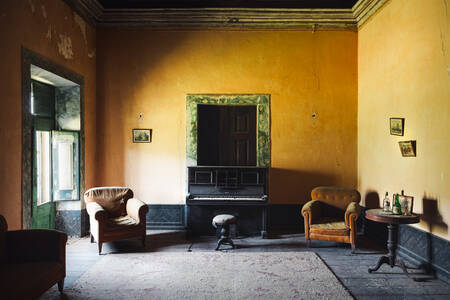 Abandoned Piano in Warm Living Room Poster