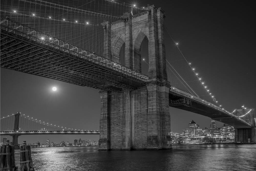 Brooklyn bridge at night with full moon