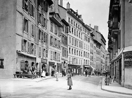 Geneva - A street in old Geneva with shops in 1900