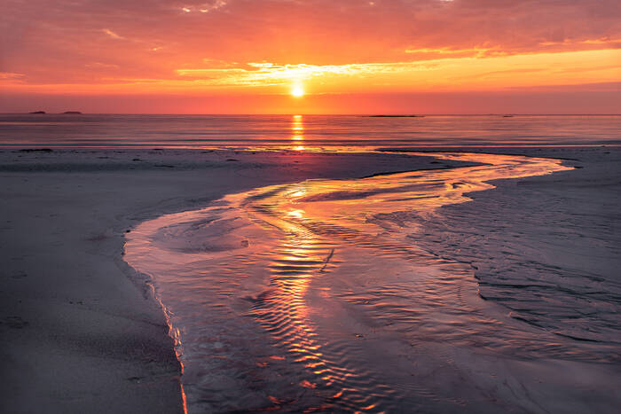 Solnedgång på Rambergs strand i Lofoten, Norge Solnedgång på Rambergs strand i Lofoten, Norge