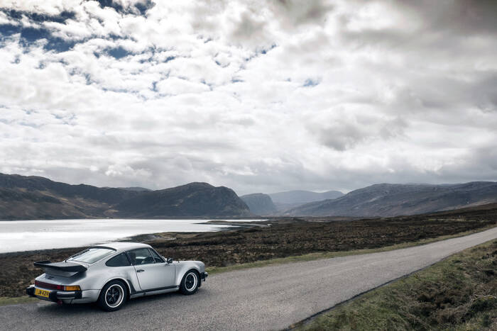 Porsche 911 Turbo driving in Scottish Highlands Porsche 911 Turbo driving in Scottish Highlands