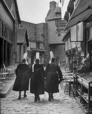 Women in traditional costume in Cherbourg in 1948