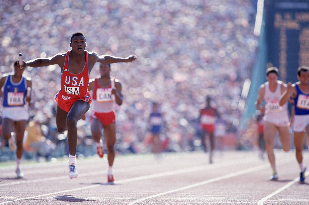 Carl Lewis crosses the line US 4x100m relay Los Angeles 1984