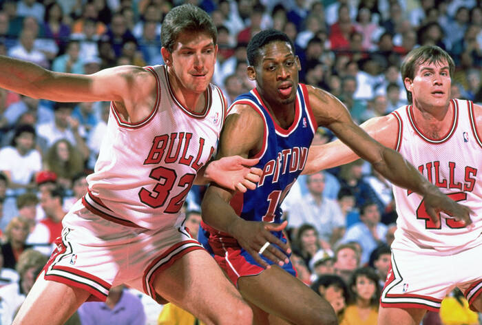 Dennis Rodman battles the Bulls in the 1990 Dennis Rodman battles the Bulls in the 1990