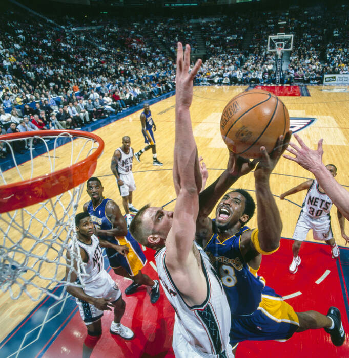 Kobe Bryant drives against the Nets Kobe Bryant drives against the Nets